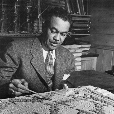 Paul R. Williams, FAIA, in front of fireplace that still exists. Courtesy of John Arnold, AIA.